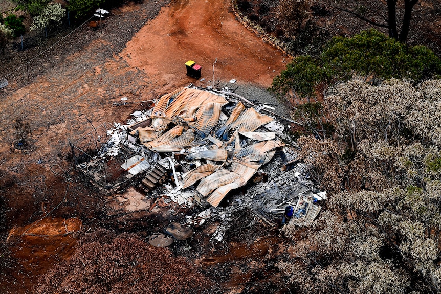 This home was destroyed. But the bins survived.