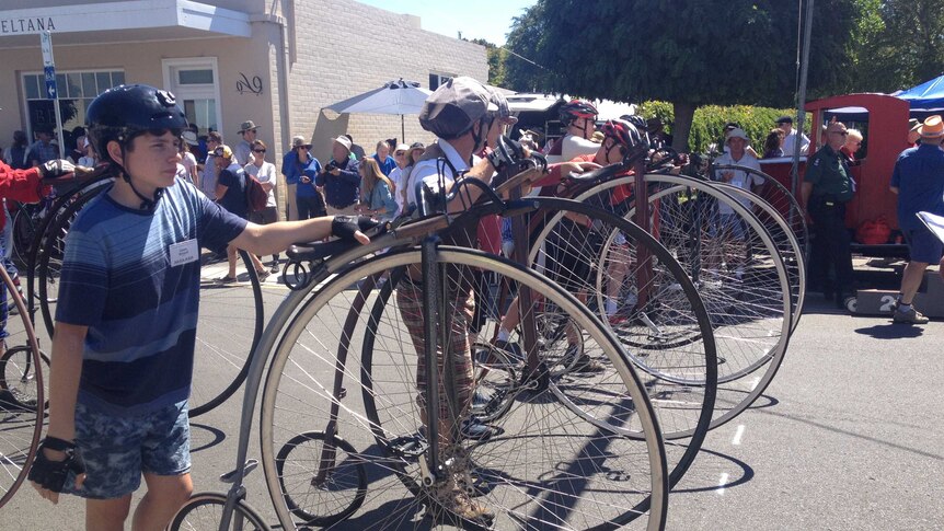 Penny farthing riders in Evandale