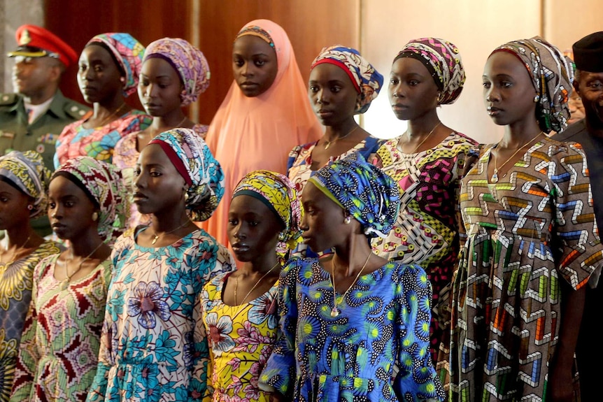 Some of the 21 Chibok schoolgirls released by Boko Haram look on during their visit to meet President Muhammadu Buhari.