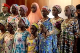 Some of the 21 Chibok schoolgirls released by Boko Haram look on during their visit to meet President Muhammadu Buhari.