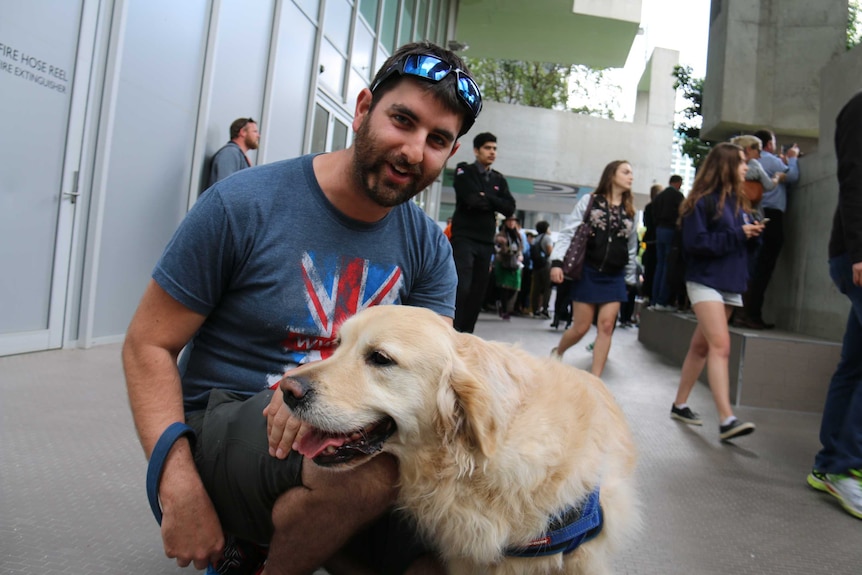 Toby Brennan with Edison the dog