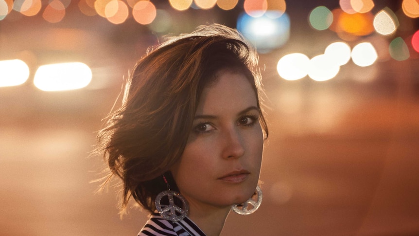 Missy Higgins in a promotional image at night