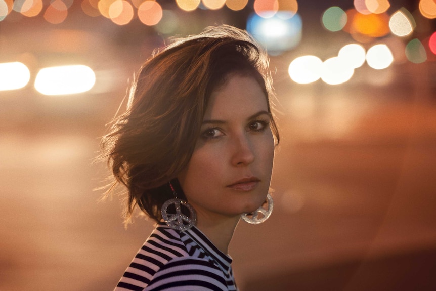 Missy Higgins in a promotional image at night