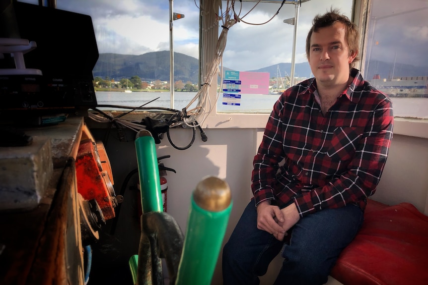 Ethan O'Neal lives full time on a boat at Prince of Wales marina in Hobart. July 2021.