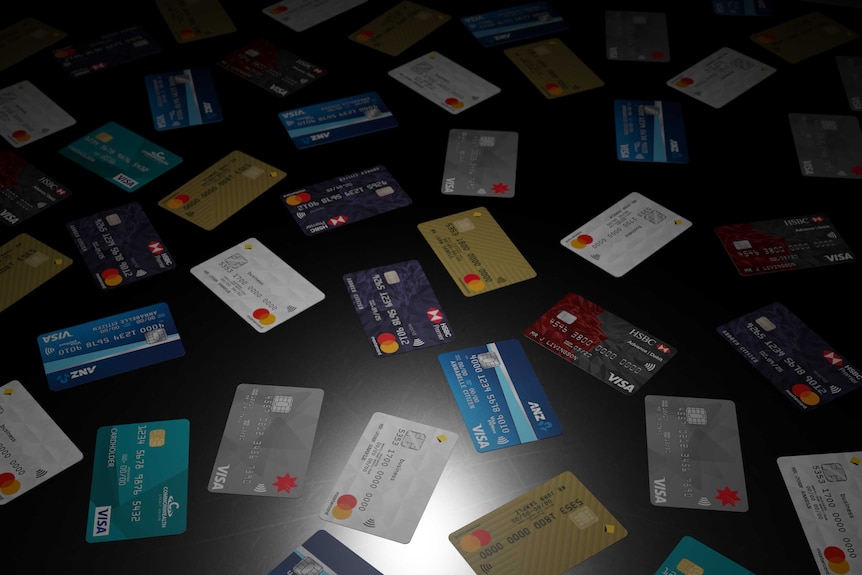 Images of credit cards dropped on the floor.