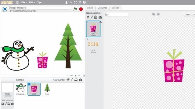 Scratch edit window shows image of snowman and tree, window on right shows gift box