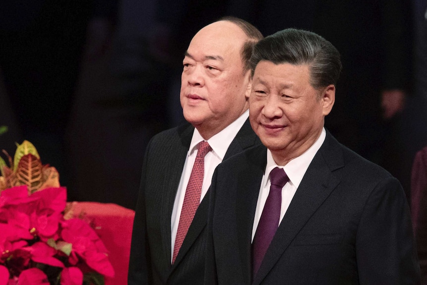 Chinese President Xi Jinping, right, and new Macao Chief Executive Ho Iat Seng
