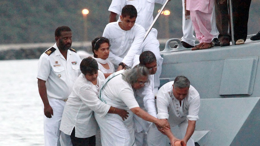 Gandhi's great grandson poured the ashes into the sea.