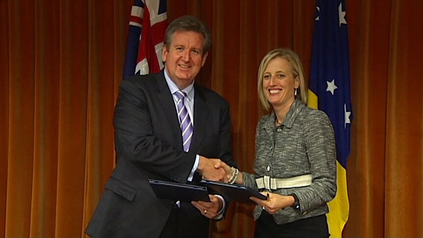 Barry O'Farrell and Katy Gallagher say the deal will mean closer cooperation between their Governments.