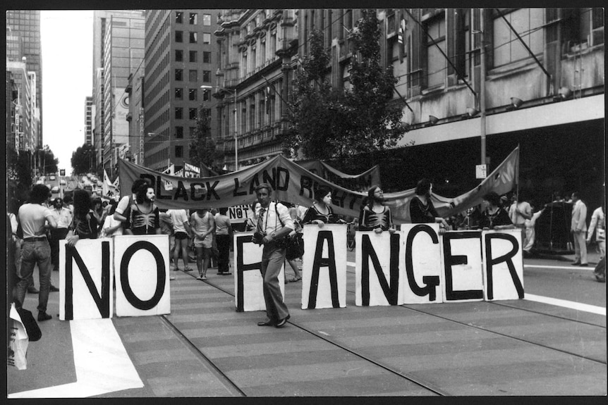 People walking through the streets in a 1978 rally, opposing the Ranger Uranium Mine in Melbourne.
