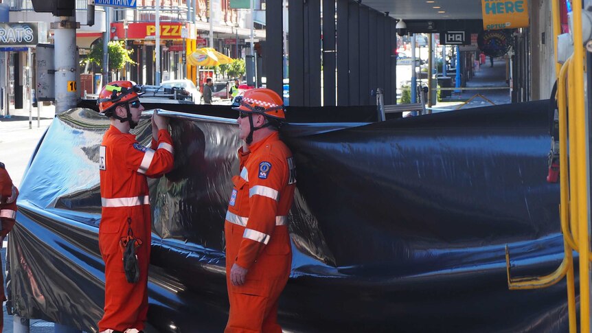 Two SES workers on Hindley Street following fatal fight.