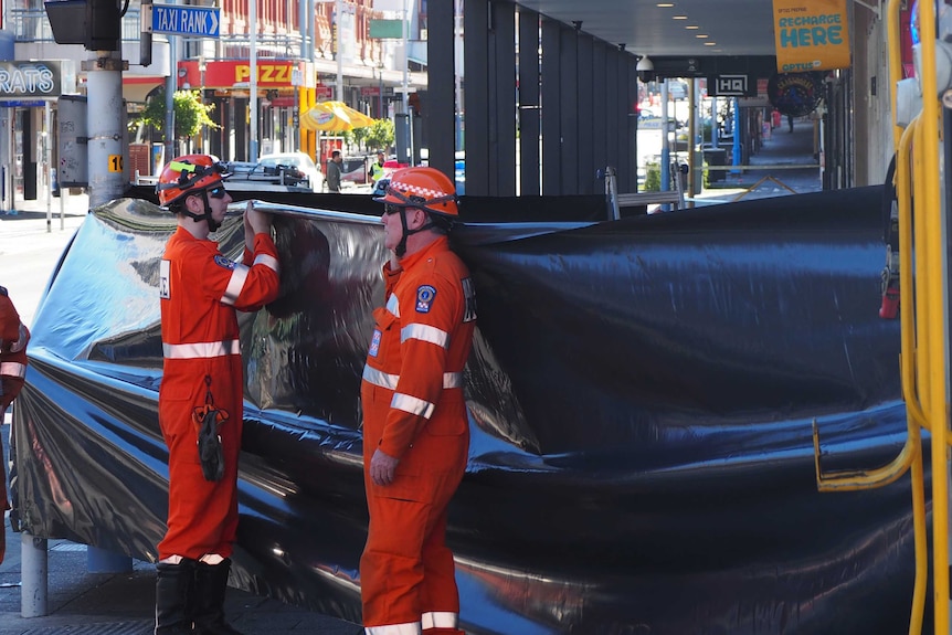 Two SES workers on Hindley Street following fatal fight.
