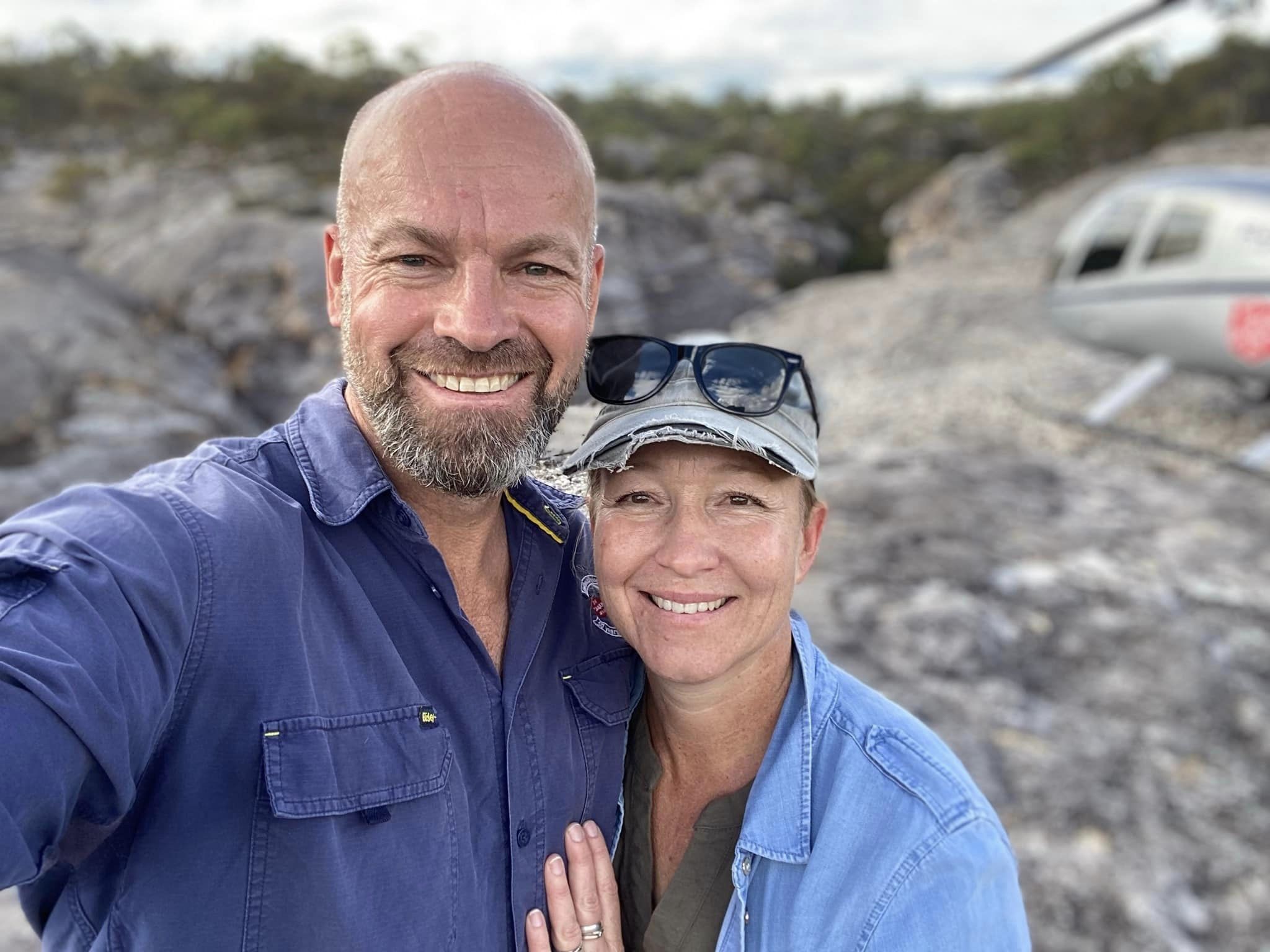 a man and a woman smiling