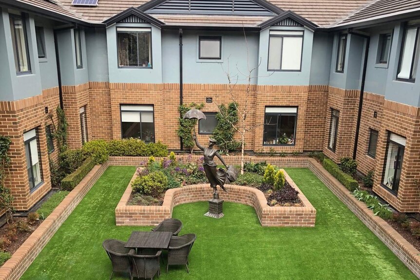A picturesque courtyard with statue