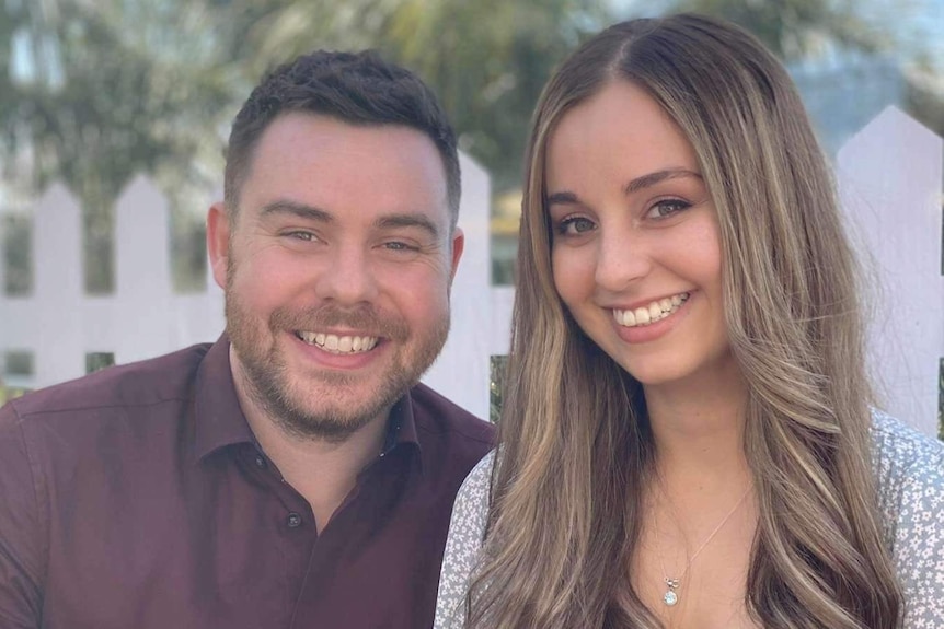 Chris Ridsdale and Celeste Manno smile as they pose for a photo together.