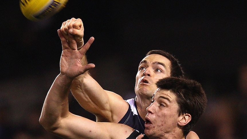 Matthew Kreuzer is hopeful of overcoming a calf injury to take on the Swans.