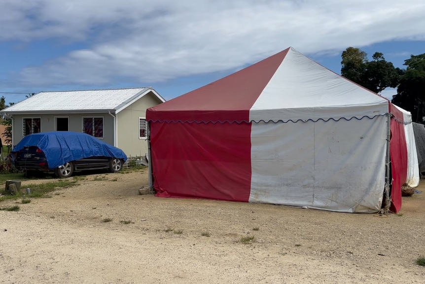The tent church at Lisala's new home.