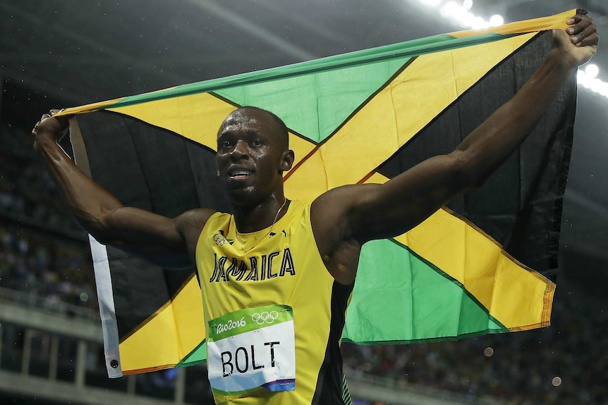 Usain Bolt celebrates after winning the Rio 200m