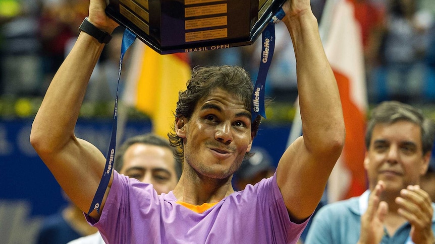 Sao Paulo victory ... Rafael Nadal celebrates with the Brazil Open trophy.