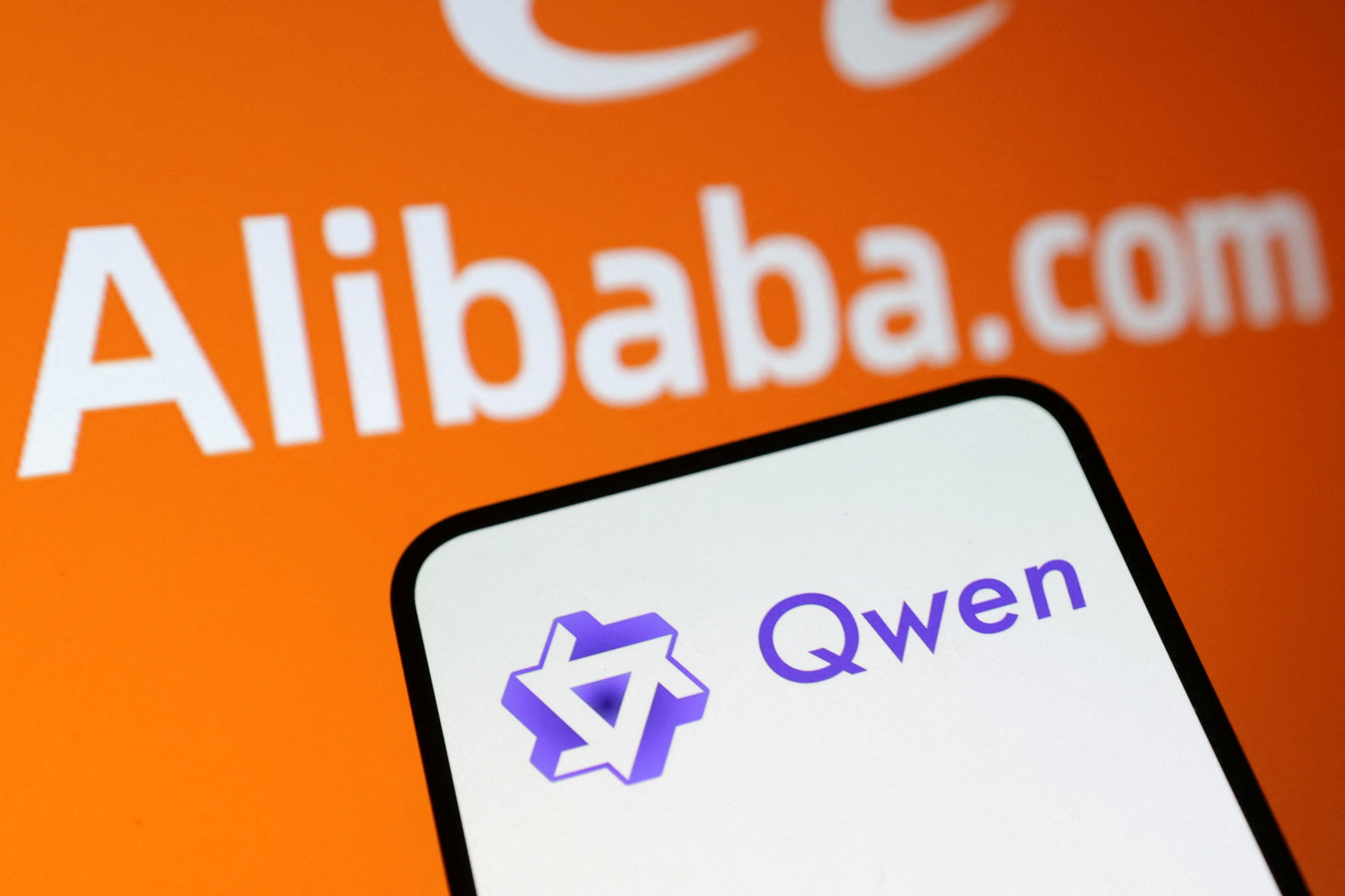 A phone with a purple logo on its screen saying "Qwen", in front of an orange background saying "Alibaba.com".
