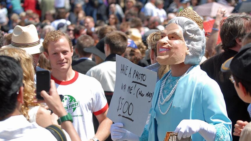 A man dressed as the Queen during the Royal visit to Melbourne's Federation Square on October 26, 2011.