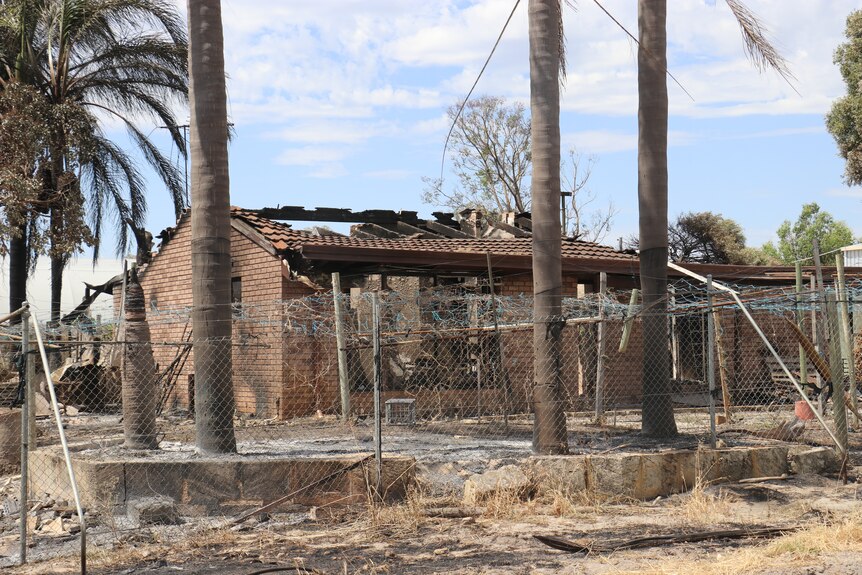 A burnt-out home in Mariginiup in Perth's north.