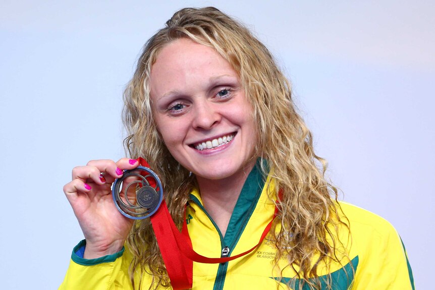 Keryn McMaster shows off her bronze medal
