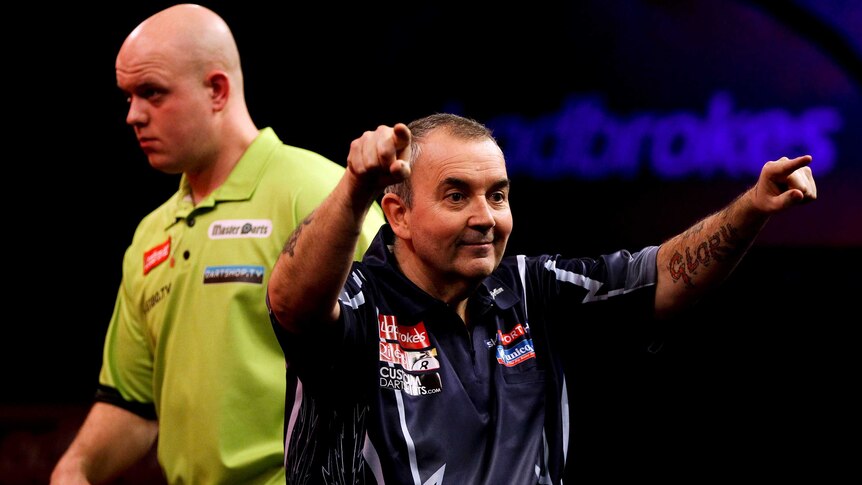 Comeback win ... Phil Taylor came from 4-2 down to beat Michael van Gerwen 7-4.