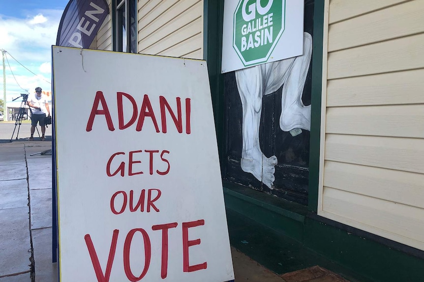 Signs saying 'Adani gets our vote' and 'Go Galilee Basin' in Clermont in central Queensland.