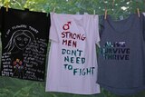 T-shirts painted with messages from survivors of domestic violence