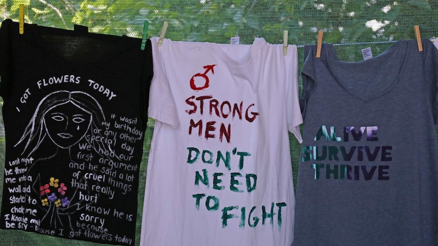 T-shirts painted with messages from survivors of domestic violence