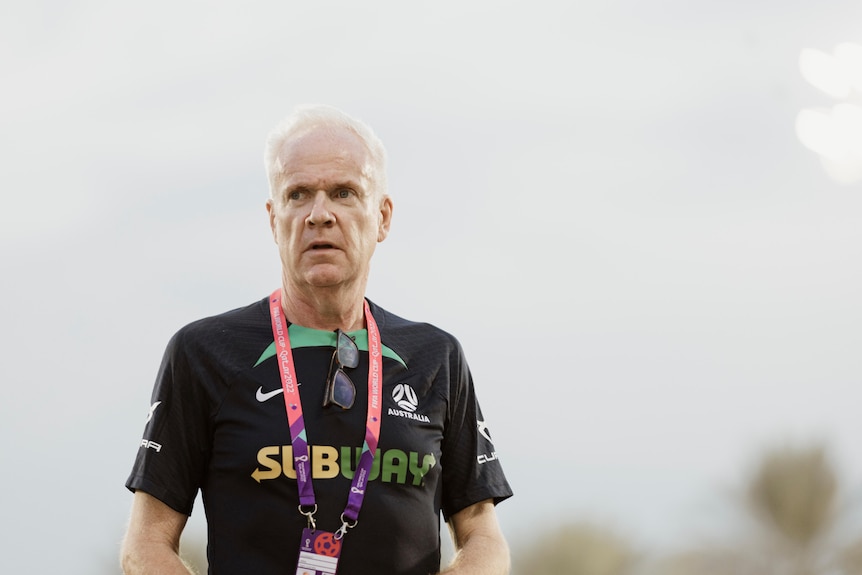 Socceroos 'mind coach' Mike Conway wears a lanyard and Subway-branded shirt at training at the Qatar World Cup.