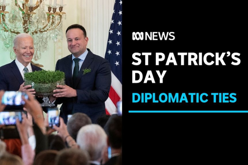 St Patrick's Day, Diplomatic Ties: U.S. President Joe Biden and Ireland's Taoiseach Leo Varadkar lift up a bowl of shamrocks.