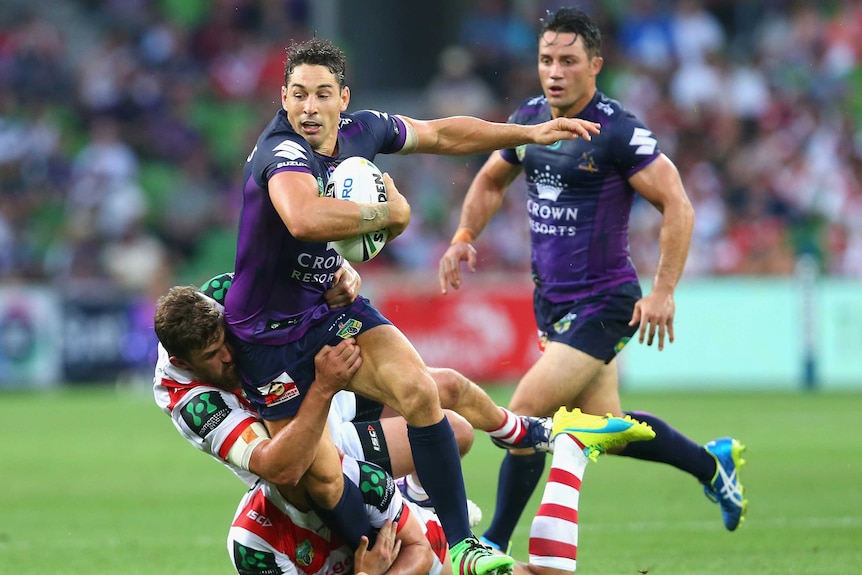 Back with a bang ... Billy Slater taking on the Dragons on Monday night