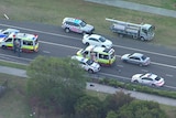 Emergency vehicles and cars on the road