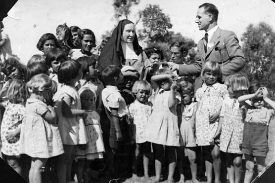 Sister Kate with children, circa 1936
