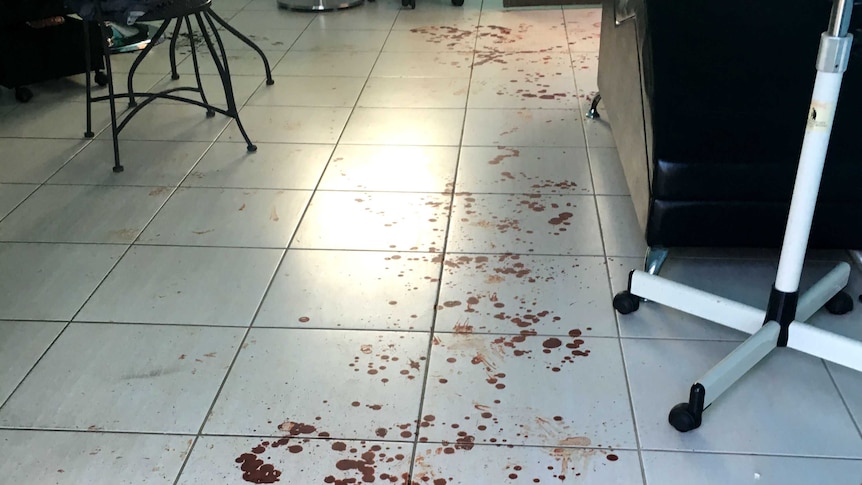 Blood on a tiled floor.