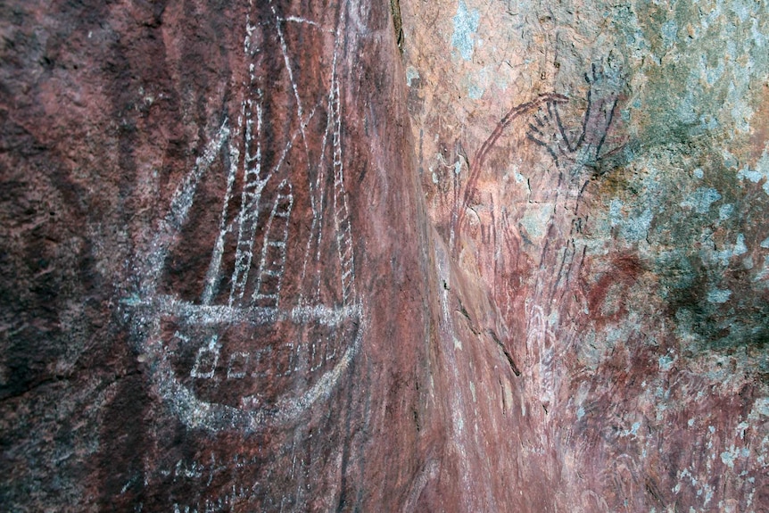 A close-up shot of two rock paintings.