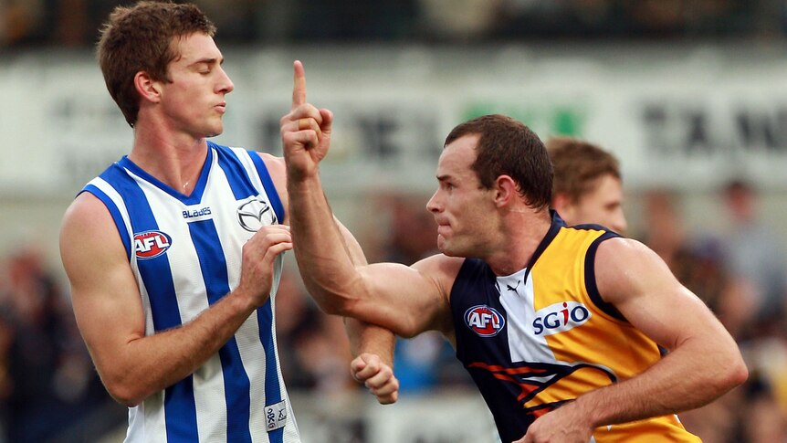 How do you like that ... Shannon Hurn (R) celebrates one of his goals at Subiaco Oval.