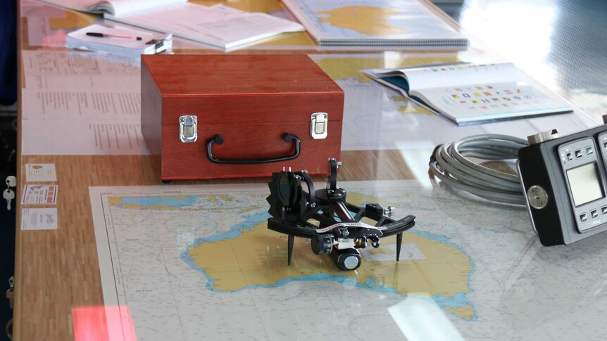A sextant on a table on the Investigator's bridge
