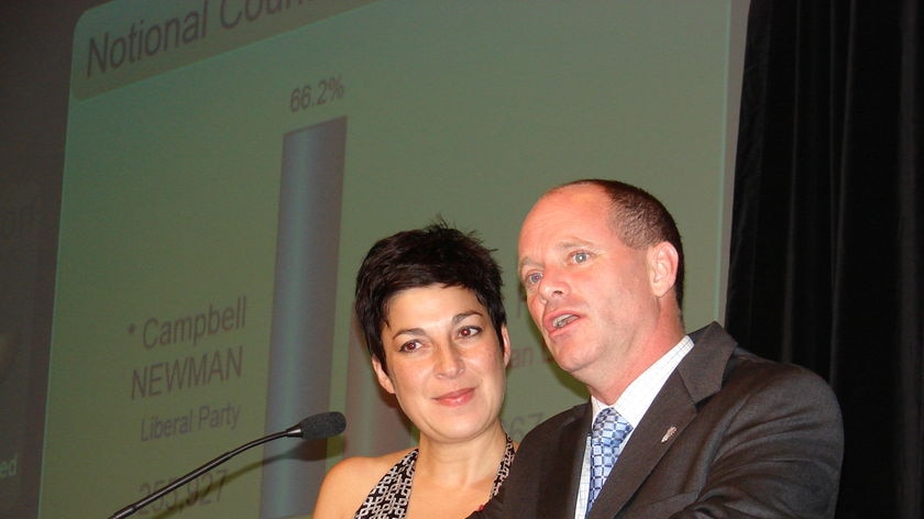 Liberal Lord Mayor Campbell Newman claims victory in the Brisbane election, with wife Lisa by his side in the tally room, saying he was humbled by the size of the result.