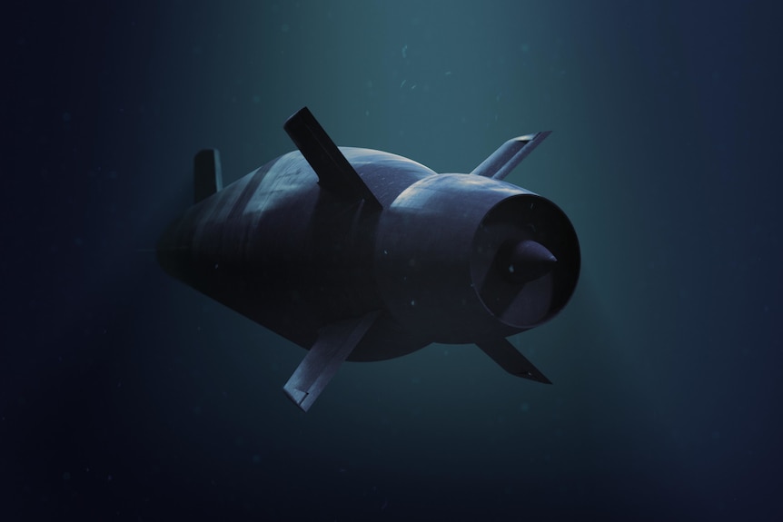 The submarine is pictured underwater, and from behind, with the propulsion units shown.