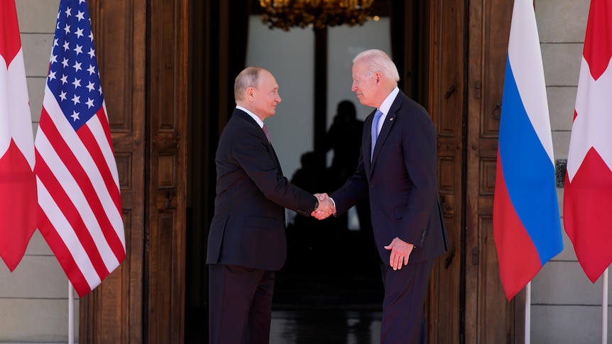 President Joe Biden and Russian President Vladimir Putin, shake hands at the 'Villa la Grange'