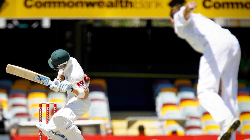 Ouch... Michael Clarke is struck in the ribs by Morne Morkel early on day five.