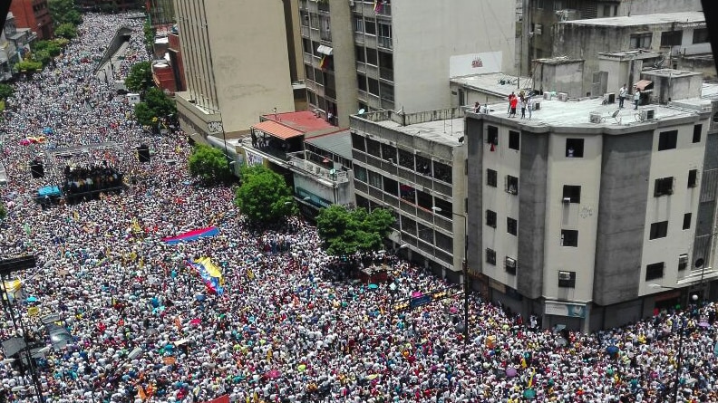 Opposition activists march in Caracas.