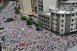 Opposition activists march in Caracas.