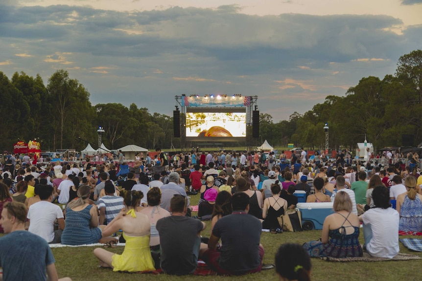 Festival goers brave the heat to watch the presentation