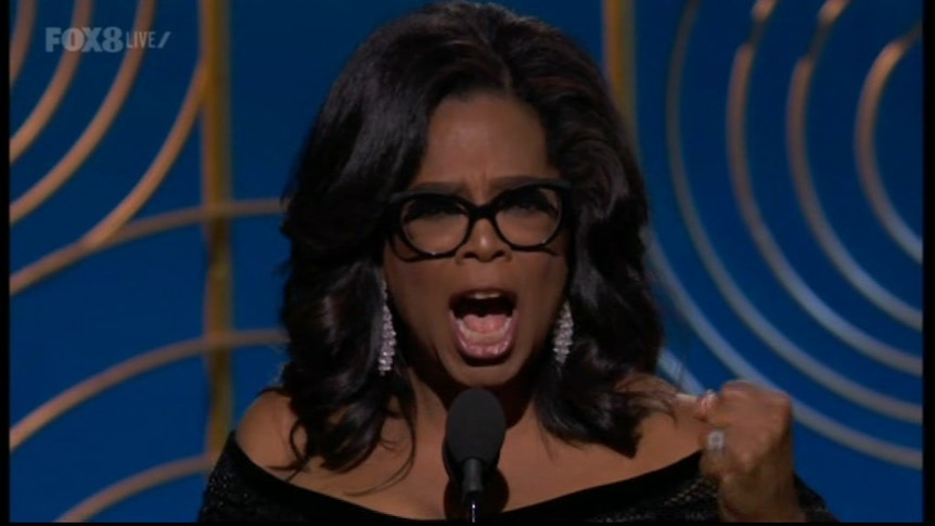 Oprah Winfrey tells the Golden Globes audience a "new day" is on the horizon