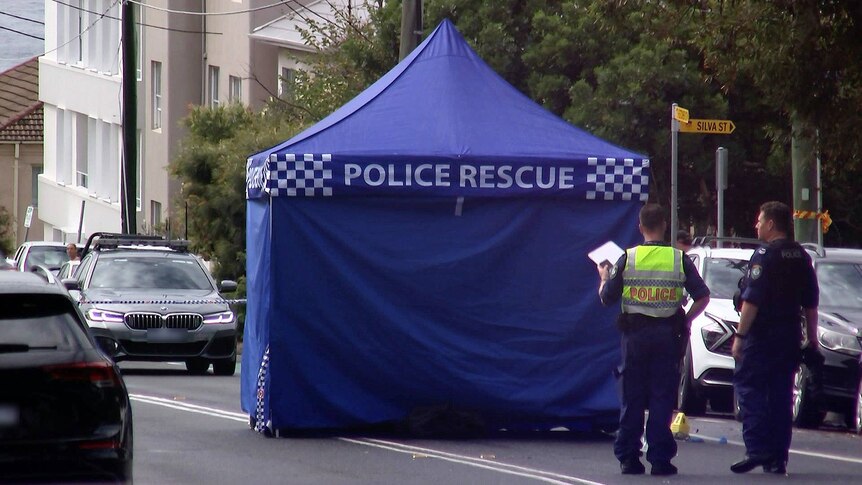 a police tent set up at tamarama where they are investigating the death of a man on sunday morning
