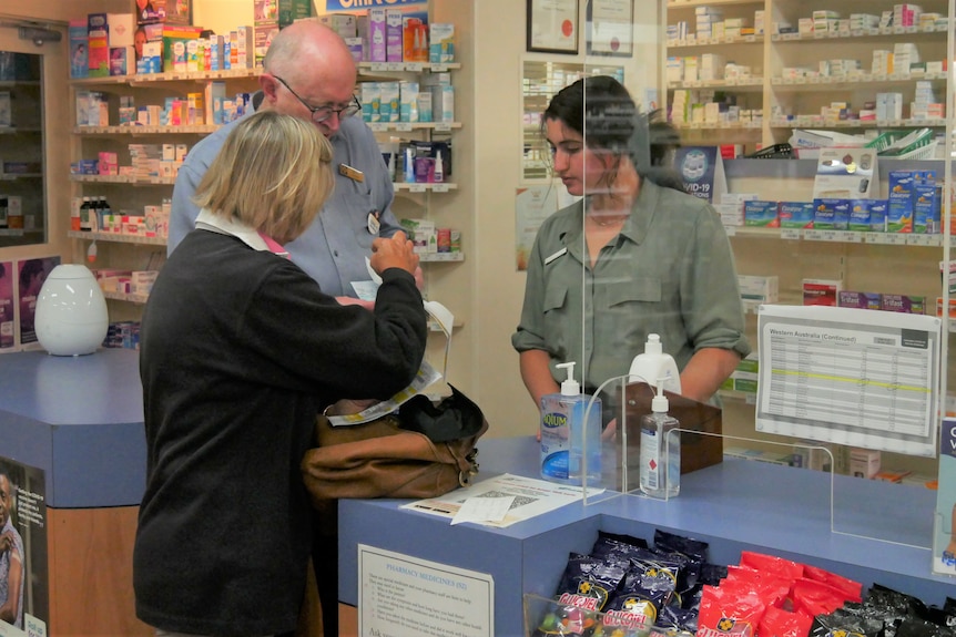 a man in a pharmacy